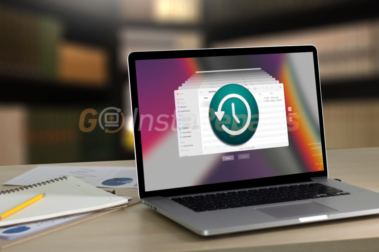 Apple macbook displaying time machine on the screen